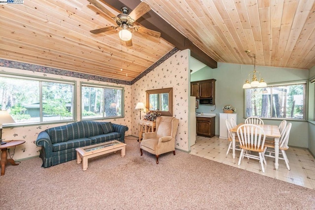 carpeted living room featuring vaulted ceiling with beams, a wealth of natural light, wooden ceiling, and ceiling fan