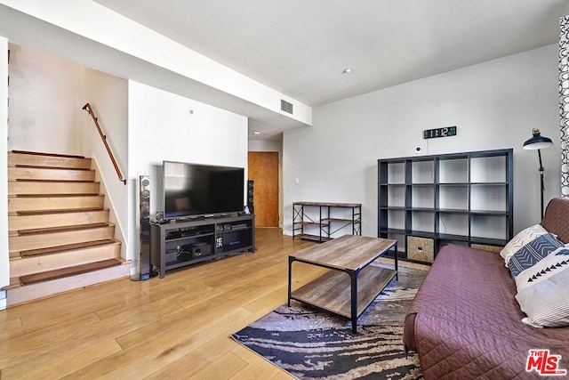 living room with hardwood / wood-style flooring