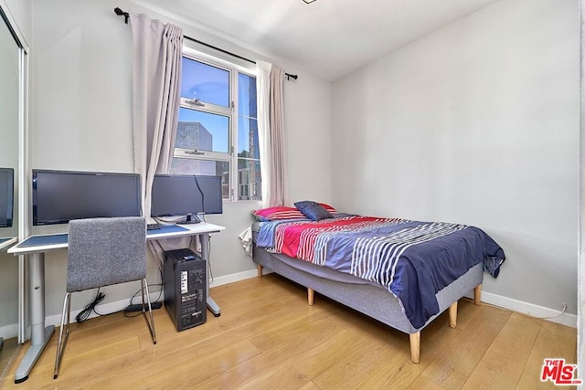 bedroom featuring light hardwood / wood-style flooring