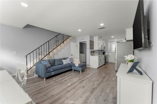 living room featuring light hardwood / wood-style flooring