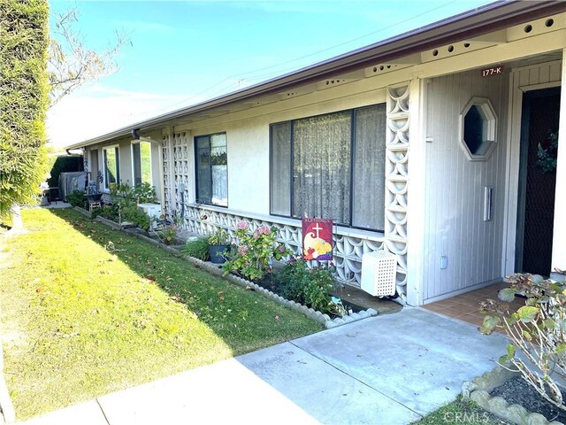 exterior space with a yard