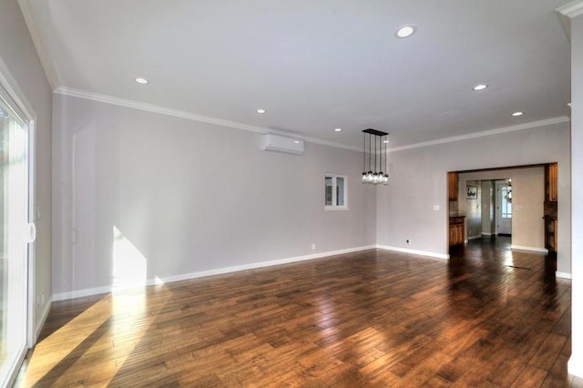 unfurnished room featuring a wall unit AC, dark hardwood / wood-style flooring, and crown molding