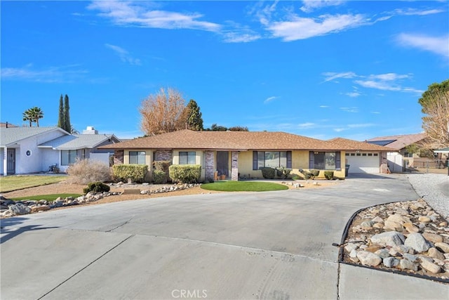 ranch-style house featuring a garage