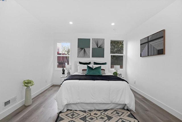 bedroom with wood-type flooring