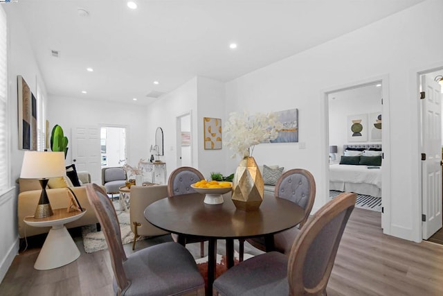 dining area featuring light wood-type flooring