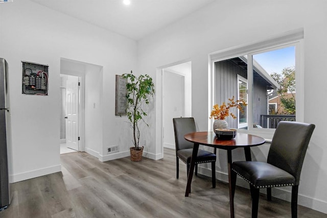 dining area with wood-type flooring