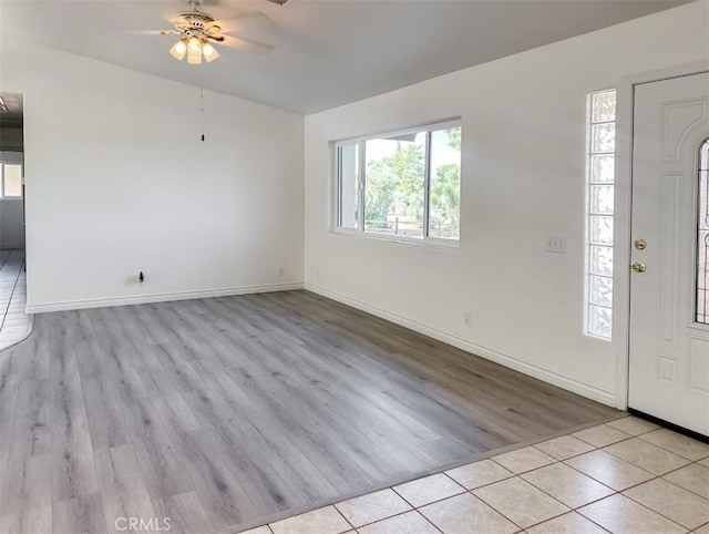 foyer featuring light hardwood / wood-style floors and ceiling fan