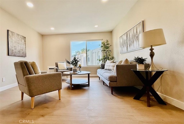 sitting room with light hardwood / wood-style flooring