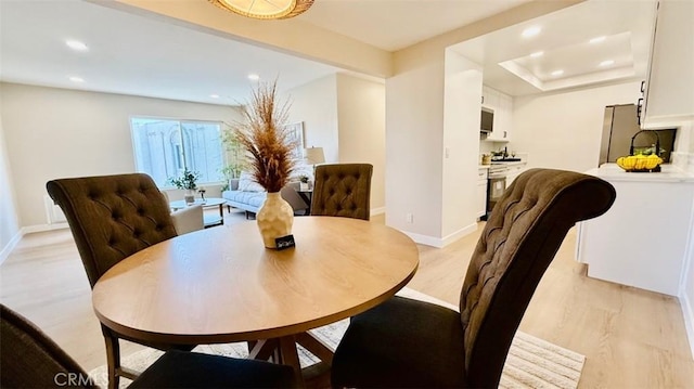 dining room featuring light hardwood / wood-style floors