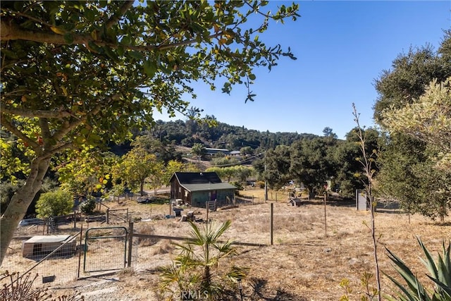 exterior space with a rural view