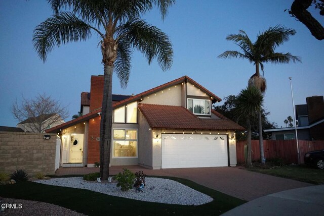 view of front of home with a garage