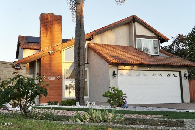 view of front of house with a garage