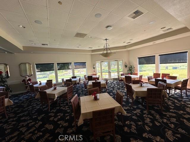 dining space with carpet floors