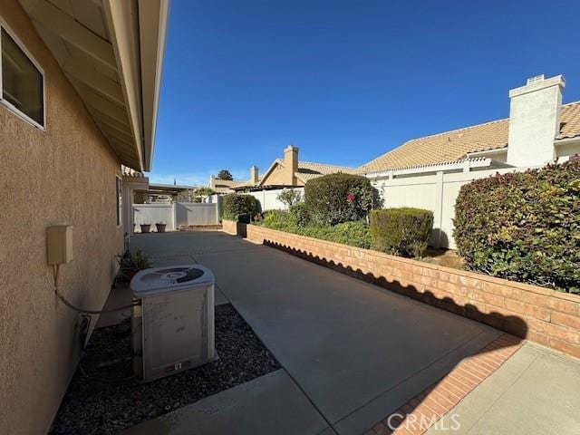 view of patio featuring cooling unit