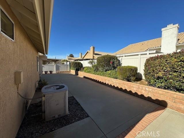 view of patio / terrace featuring cooling unit