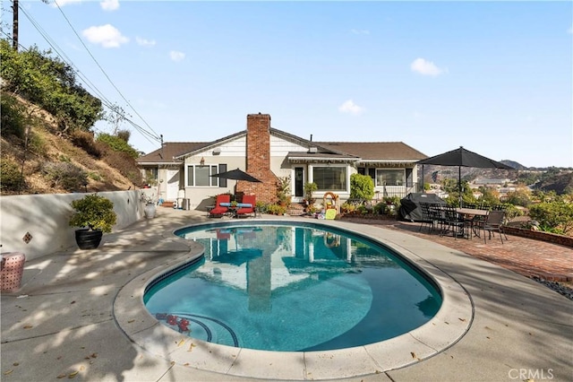 view of pool with a patio