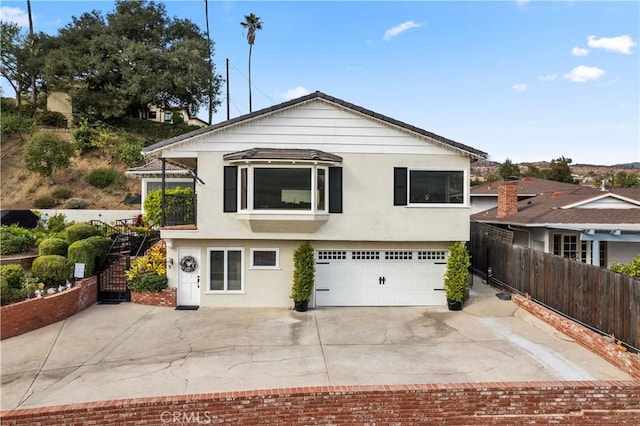 view of front of property with a garage