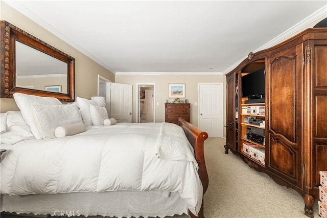 carpeted bedroom featuring crown molding