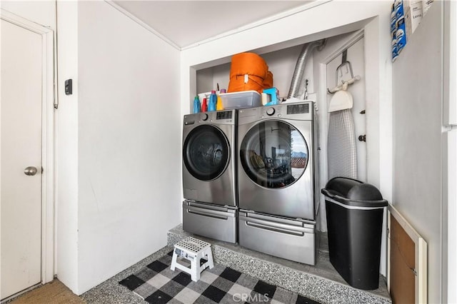 washroom featuring independent washer and dryer