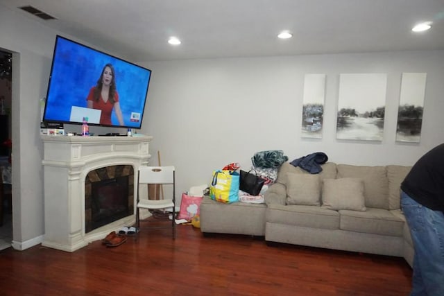 living room featuring dark hardwood / wood-style floors