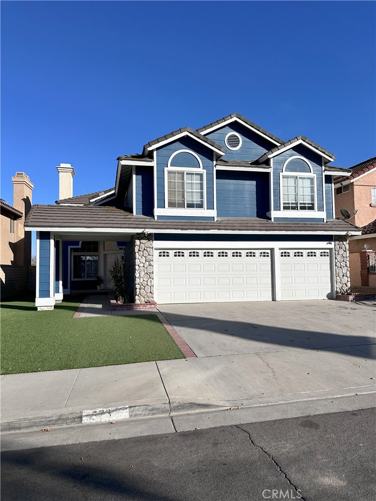 front facade with a garage