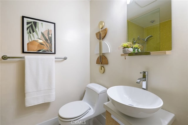 bathroom featuring sink and toilet