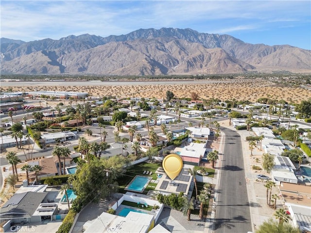 bird's eye view with a mountain view