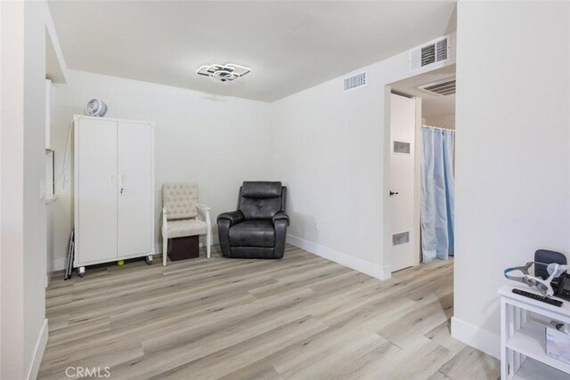 living area featuring light wood-type flooring