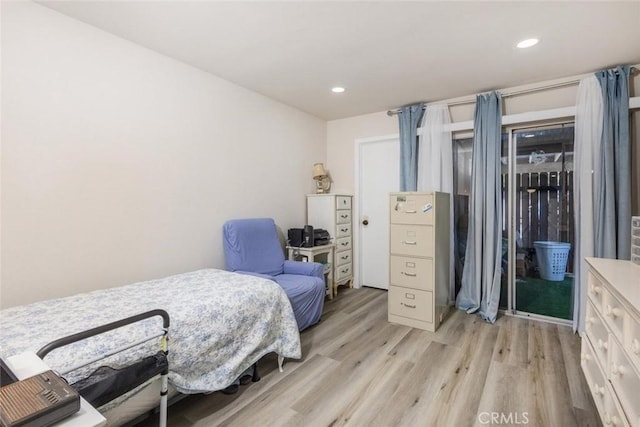 bedroom with light wood-type flooring