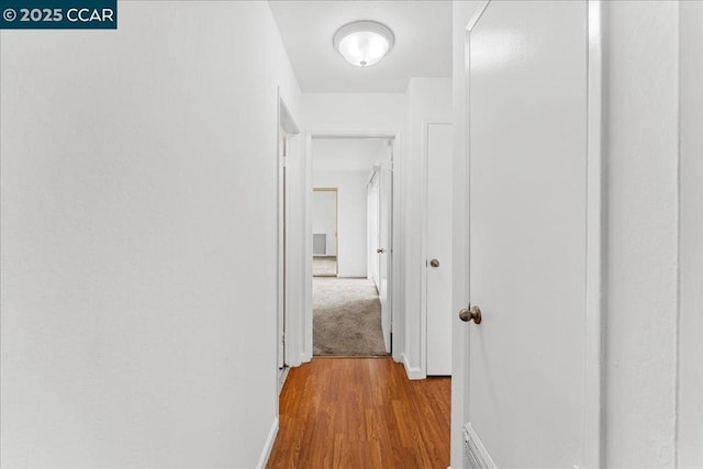 hallway featuring light wood-type flooring