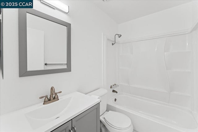 full bathroom featuring vanity, shower / bathtub combination, and toilet