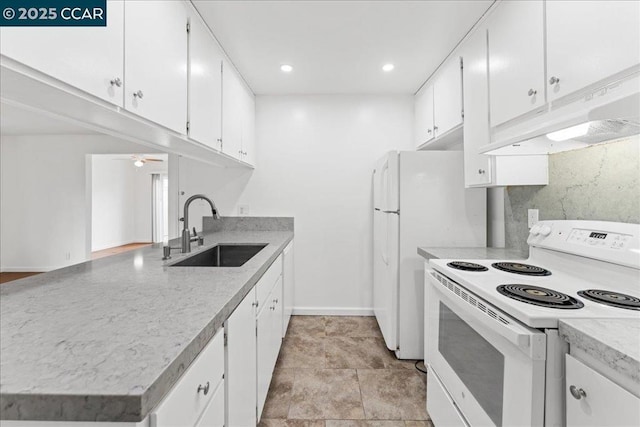 kitchen with sink, white cabinets, ceiling fan, kitchen peninsula, and white appliances