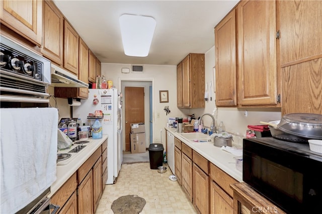 kitchen featuring black appliances and sink