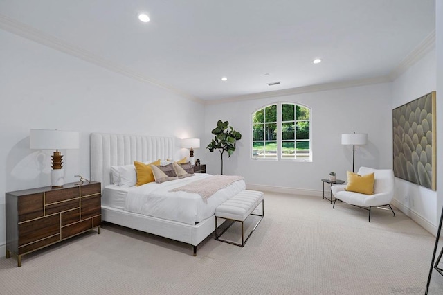 bedroom featuring ornamental molding and light carpet