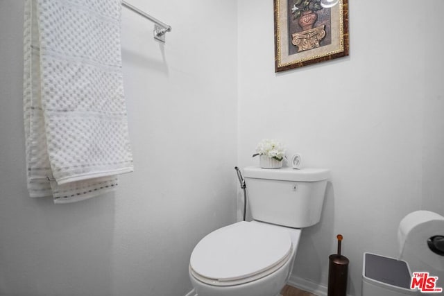 bathroom featuring toilet