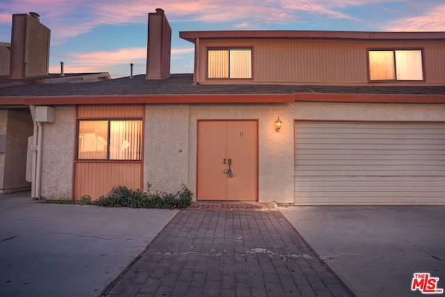 view of front of house with a garage