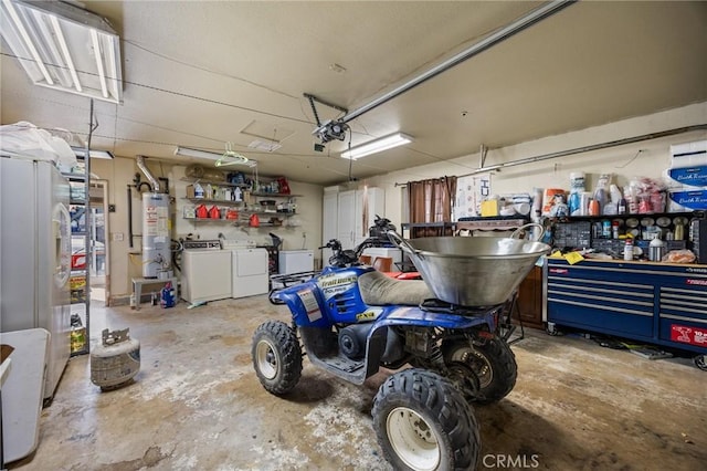 garage featuring independent washer and dryer, gas water heater, a garage door opener, and white fridge with ice dispenser