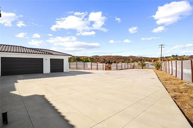 view of patio featuring fence