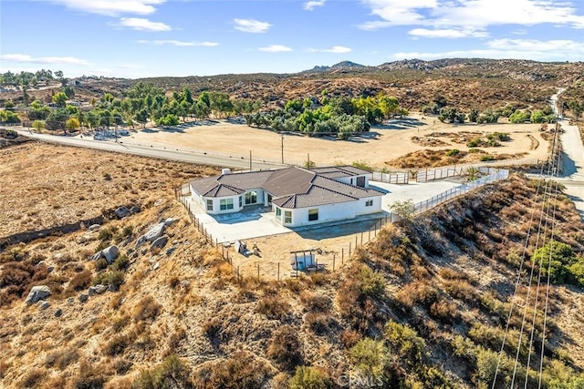 birds eye view of property featuring a rural view