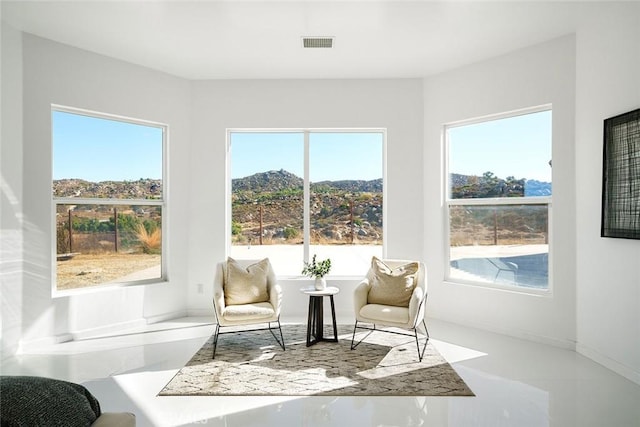 sitting room featuring visible vents