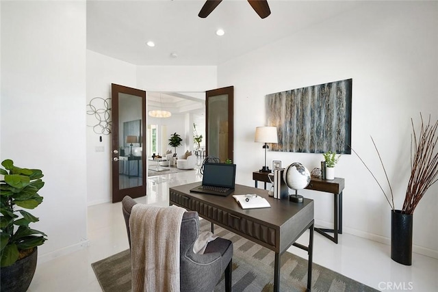 office featuring finished concrete floors, recessed lighting, ceiling fan, and baseboards