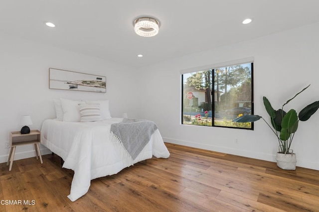 bedroom featuring hardwood / wood-style flooring