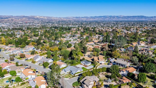 drone / aerial view featuring a mountain view