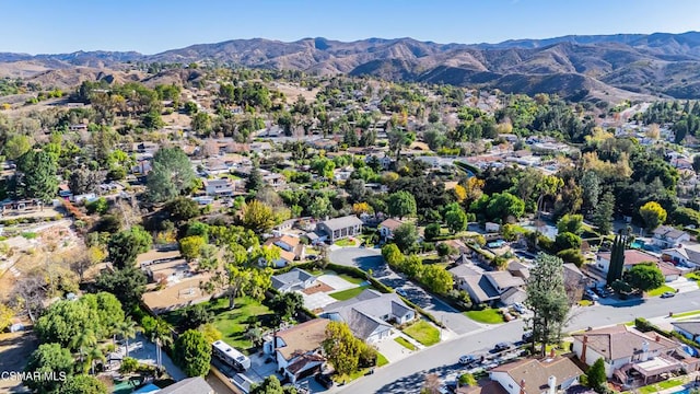 drone / aerial view featuring a mountain view