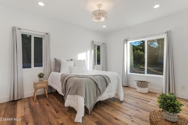 bedroom featuring hardwood / wood-style flooring