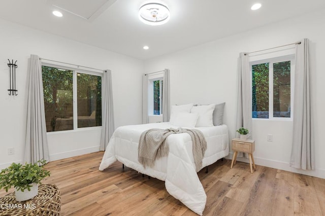 bedroom featuring light hardwood / wood-style floors