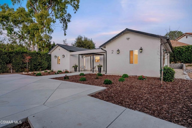 view of front of house with a patio