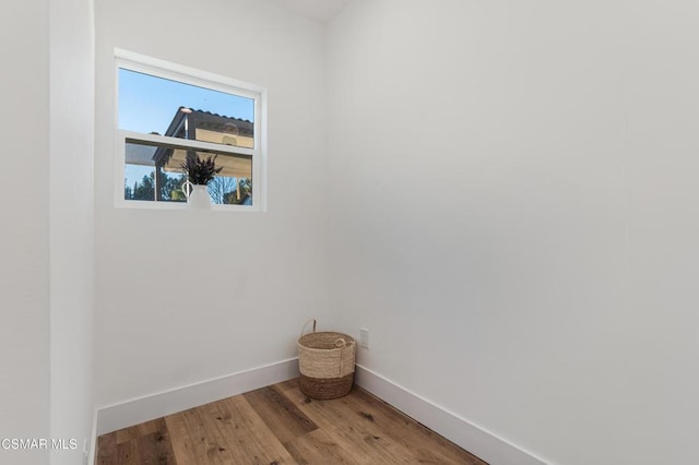 spare room featuring hardwood / wood-style floors