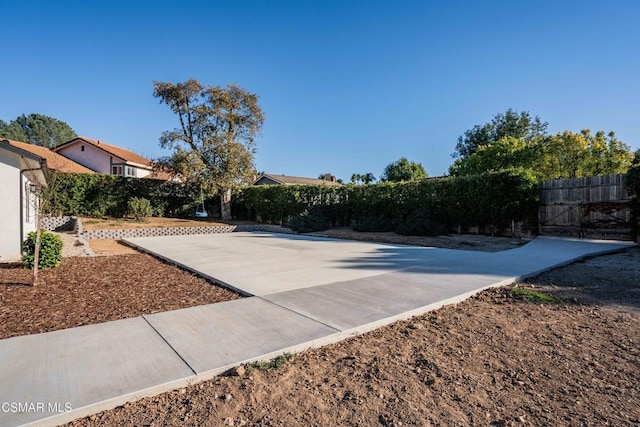 surrounding community featuring a patio area