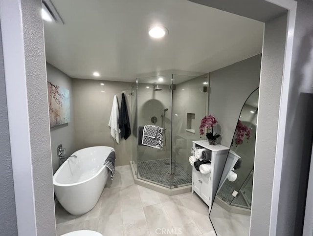 bathroom featuring plus walk in shower